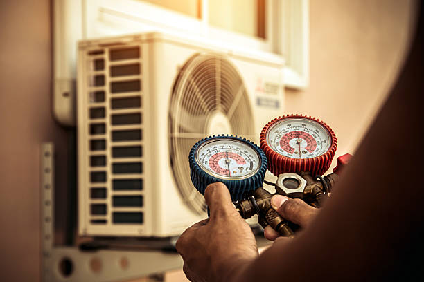 Professional Heat Pump Repair technician working in Pomeroy, OH